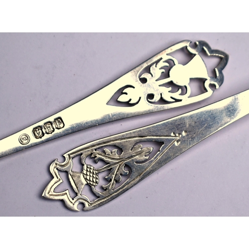 59 - A Scottish silver pickle fork with thistle-pierced finial, to/w a pair of somewhat similar long-hand... 