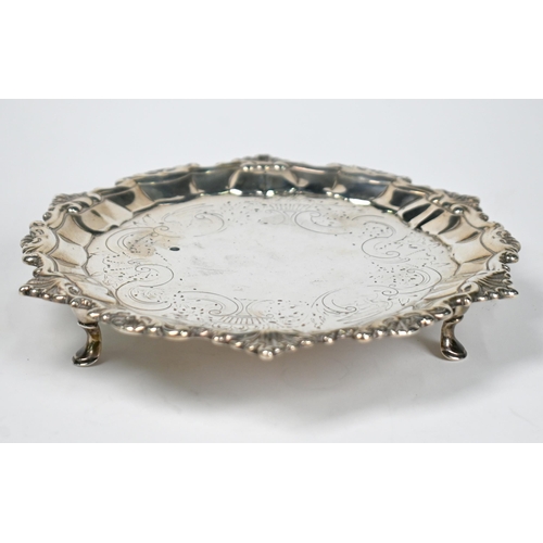 63 - A George I Irish silver card salver with shell and scroll rim and rococo-style engraving (probably 1... 