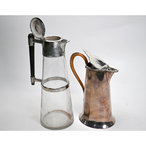 68 - A 19th Century tapering glass claret jug with electroplated mounts and ebony baton handle in the man... 