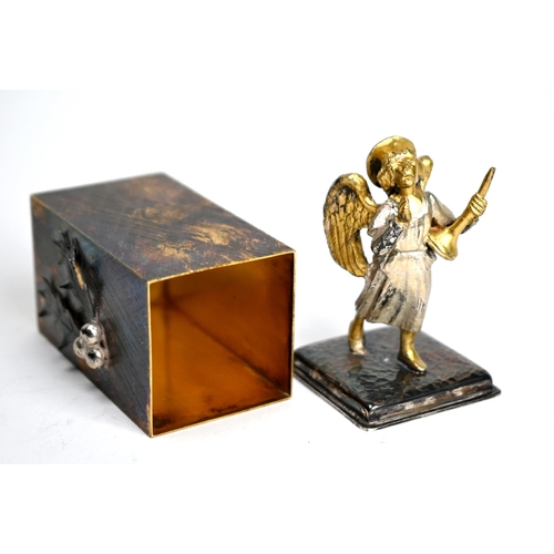 77 - Stuart Devlin: a parcel gilt silver 'Surprise' Christmas box, 'Hark! The Herald Angels Sing', the ho... 