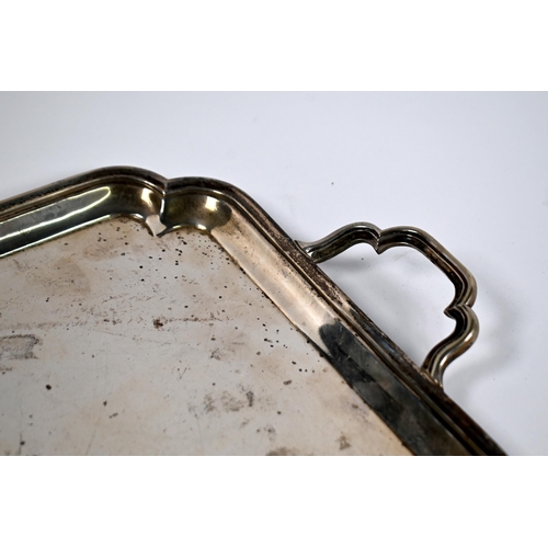 80 - A heavy quality rectangular silver tray with moulded rim and twin handles, Thomas Bradbury & Sons Lt... 