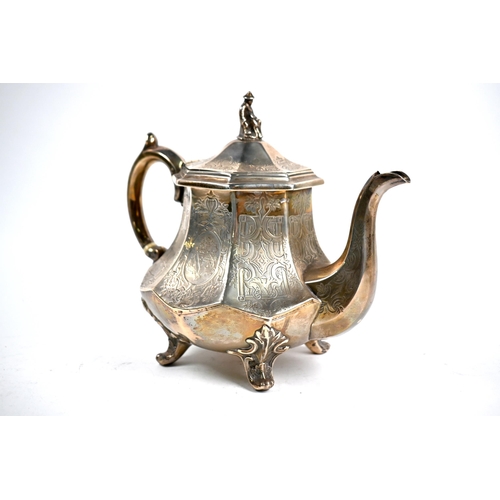 81 - A Victorian silver teapot with engraved decoration, surmounted by cast Chinese figural finial, on sc... 