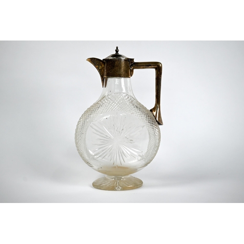 82 - A late Victorian cut glass claret jug of moonflask form, with silver collar, cover and handle, John ... 