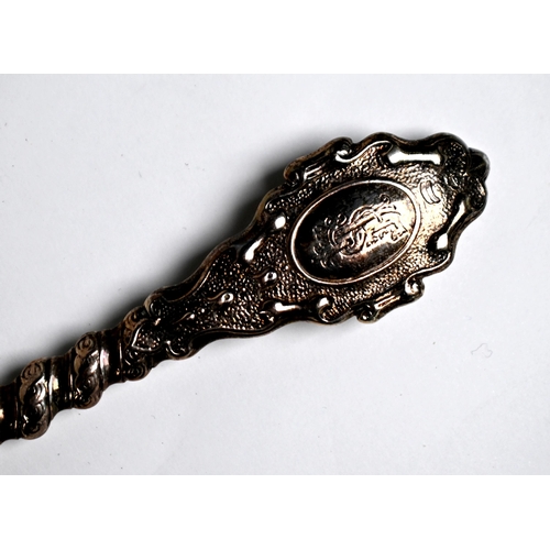 84 - A heavy quality Victorian silver soup ladle with ornate twist stem, Francis Higgins, London 1860, 8.... 