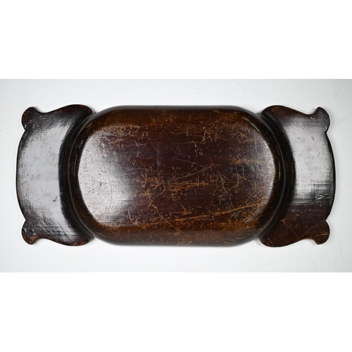 1237 - A Polynesian carved wood ceremonial dish, the broad handles worked with stylised birds, 43 x 19 cm