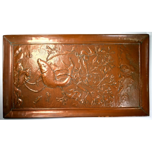 1238 - An Arts & Crafts Newlyn copper tray, the border worked with fish, scallops and whelks, stamped 'Newl... 