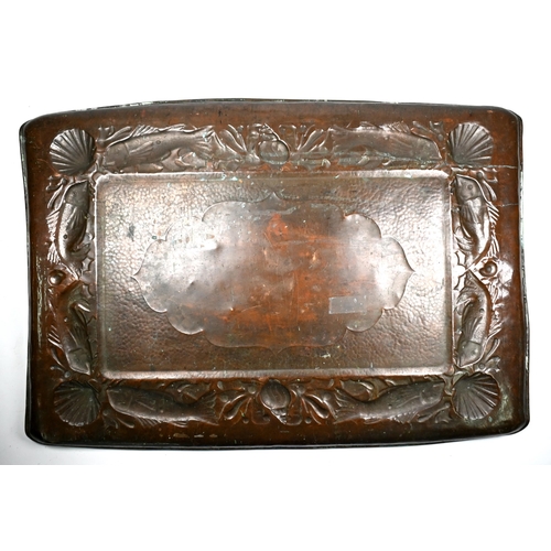 1238 - An Arts & Crafts Newlyn copper tray, the border worked with fish, scallops and whelks, stamped 'Newl... 