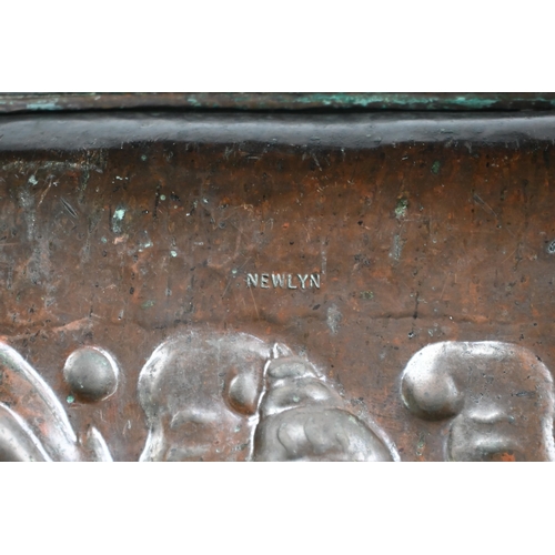 1238 - An Arts & Crafts Newlyn copper tray, the border worked with fish, scallops and whelks, stamped 'Newl... 