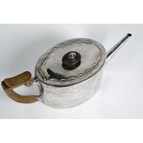 21 - A George III oval silver tea pot with engraved decoration and straight tapering spout, Charles Aldri... 