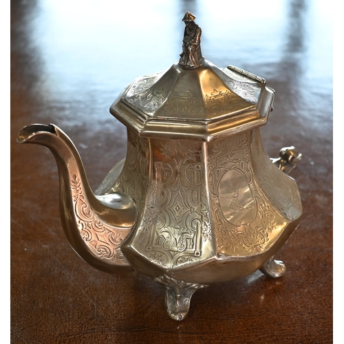 81 - A Victorian silver teapot with engraved decoration, surmounted by cast Chinese figural finial, on sc... 