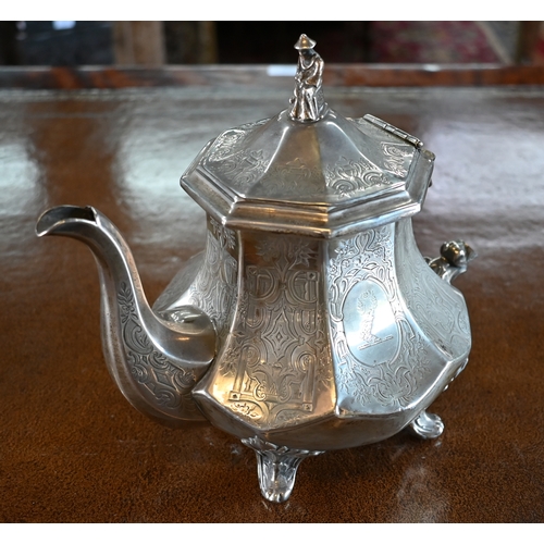 81 - A Victorian silver teapot with engraved decoration, surmounted by cast Chinese figural finial, on sc... 