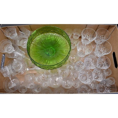 116 - A suite of Edwardian cut and etched drinking glasses to/w a part set of cut glasses and a green glas... 