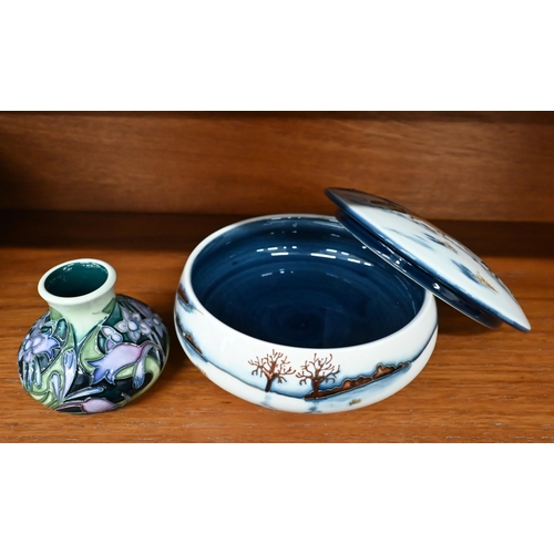 117 - A boxed Moorcroft 'Woodside Farm' bowl and cover, 12.5 cm to/w a small floral-decorated vase 5.5 cm ... 