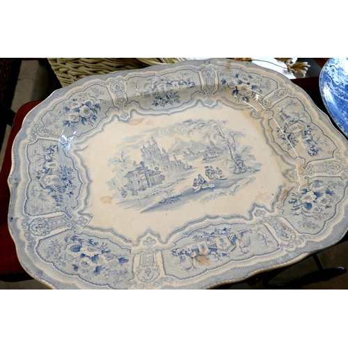 120 - A Japanese export porcelain charger, with blue and white stencilled chinoiserie decoration, 37 cm to... 