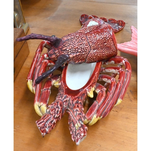 141 - A Portugese Arte Bordallo style majolica lobster, 37 cm, to/w a glazed pottery 'fish' tureen (2)