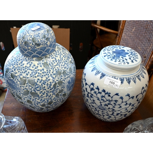 169 - Two glass decanters and stoppers, to/w two Asian blue and white globular vases and covers (4)