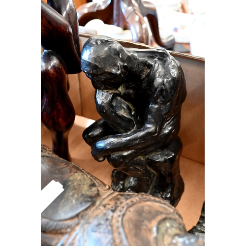 170 - A bronzed resin copy of Rodin's 'The Thinker', 25 cm, to/w an abstract carved wood figure on a simil... 