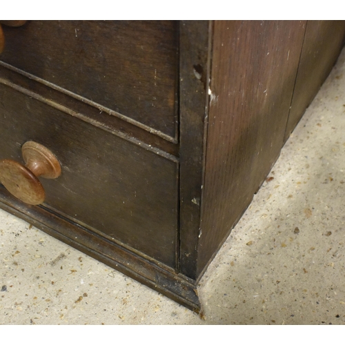 238 - An antique provincial oak chest of four long graduating drawers with turned handles, 98 cm wide x 52... 