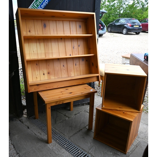 258 - A stained pine bedroom suite comprising chest of two short over three long drawers with brass handle... 