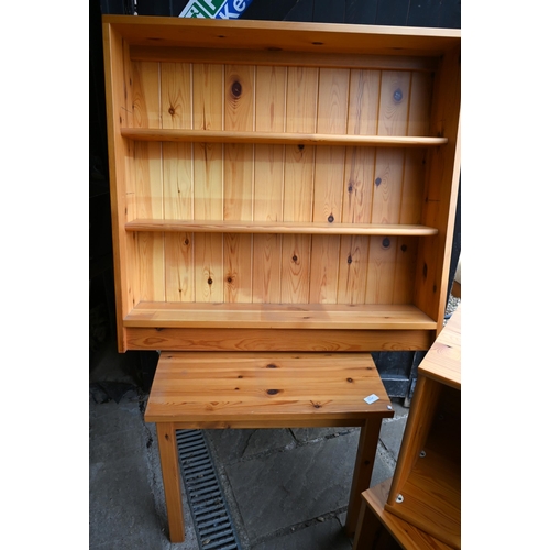 258 - A stained pine bedroom suite comprising chest of two short over three long drawers with brass handle... 