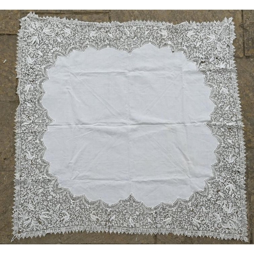 380 - A fine linen table cloth with broad lace border, 140 cm square