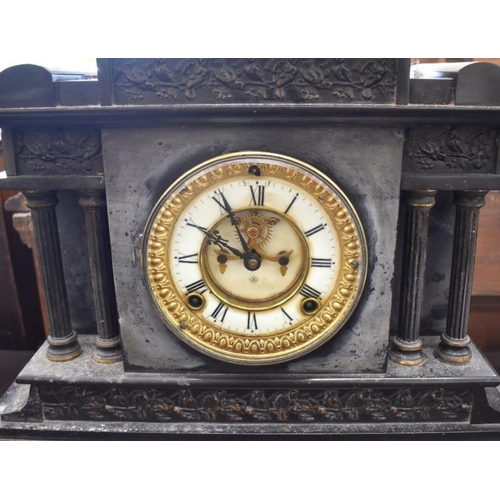 394 - An Ansonia Clock Company, New York architectural slate mantel clock surmounted by brass sphynx, with... 