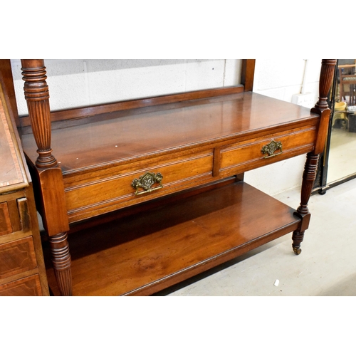 403 - Late Victorian mahogany three tier buffet, the central section fitted with two drawers, with turned ... 