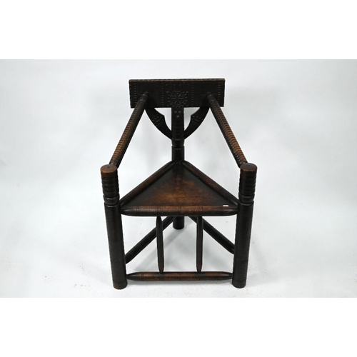 408 - A late Victorian oak turners chair, with carved decoration and panel seat (height to seat 45 cm)