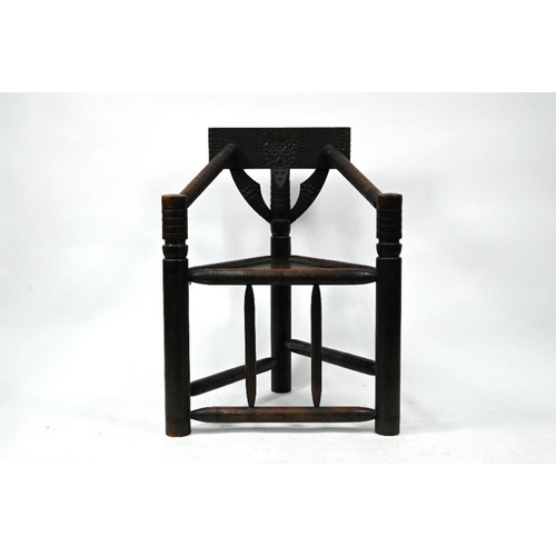 408 - A late Victorian oak turners chair, with carved decoration and panel seat (height to seat 45 cm)