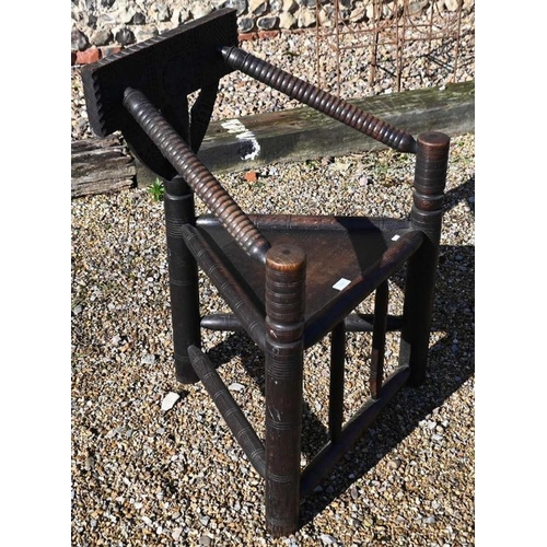 408 - A late Victorian oak turners chair, with carved decoration and panel seat (height to seat 45 cm)