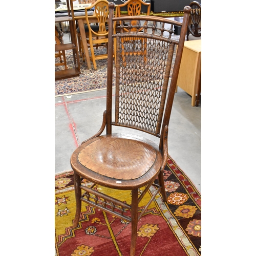 448 - A 19th century mahogany circular backed hall chair, provincial elm wheelback carver chair and oak si... 