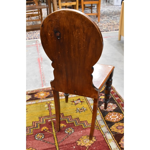 448 - A 19th century mahogany circular backed hall chair, provincial elm wheelback carver chair and oak si... 