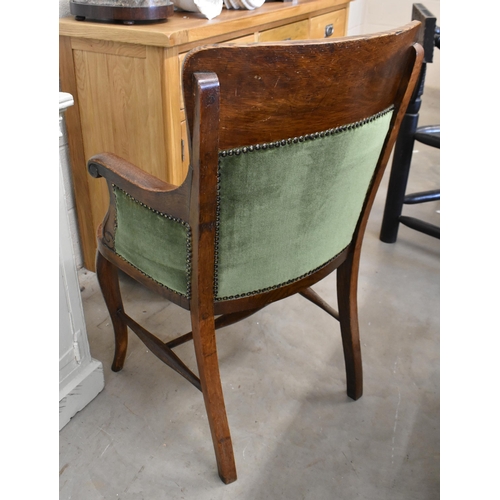 449 - Early 20th century oak elbow chair with studded green Dralon upholstery