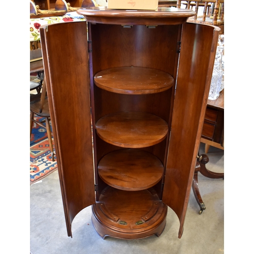 464 - A tall stained hardwood circular/drum cabinet with two doors, 50 cm dia x 122 cm h