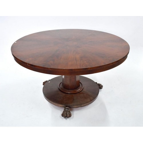 469 - A Victorian rosewood breakfast table, the circular tilt top with radiating veneers, raised on a mult... 