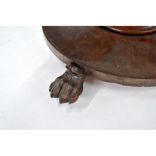 469 - A Victorian rosewood breakfast table, the circular tilt top with radiating veneers, raised on a mult... 