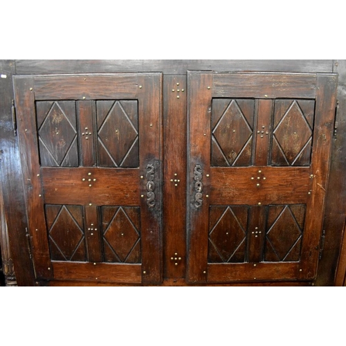 470 - A large antique French cupboard with brass studded panelled doors, 175 cm wide x 74 cm deep x 184 cm... 