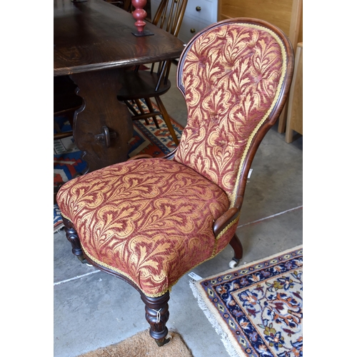 473 - Victorian mahogany framed button back nursing chair, dark red and old gold fabric upholstery