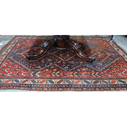 511 - Old Persian Shiraz rug with triple pole design on a red and blue ground