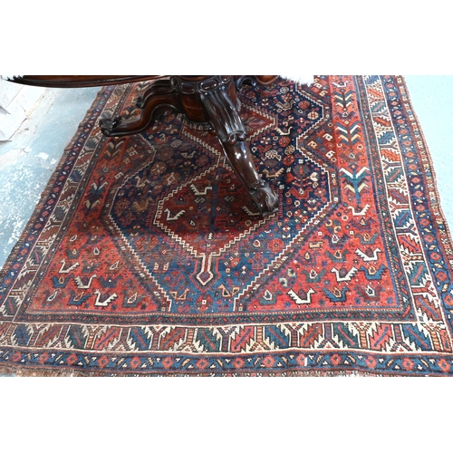 511 - Old Persian Shiraz rug with triple pole design on a red and blue ground