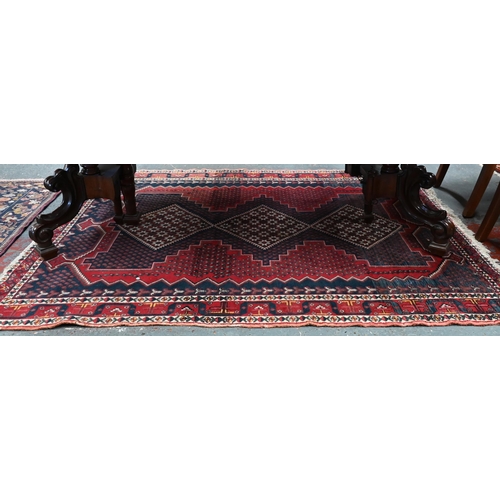 514 - Old Persian Afshar rug with triple lozenge design on a red and blue ground, 193 x 145 cm