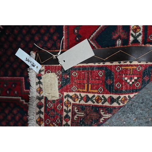 514 - Old Persian Afshar rug with triple lozenge design on a red and blue ground, 193 x 145 cm