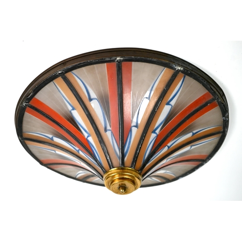 556 - An Art Deco ceiling light with painted glass leaded panels, 40 cm diam to/w an Art Deco brass four-b... 