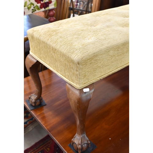 568 - A mahogany framed duet stool with old gold corduroy upholstery and cabriole legs with ball and claw ... 