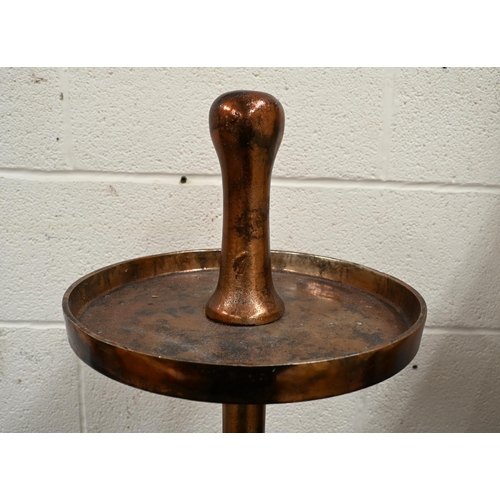 583 - Industrial design metal whatnot, three graduating circular tiers in aged coppered finish, 95 cm h