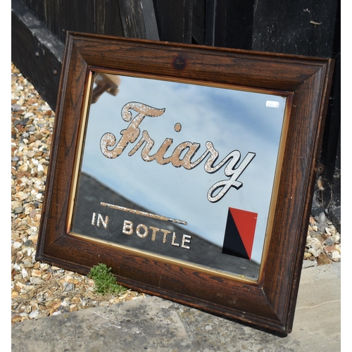 606 - A Friary oak framed advertising mirror