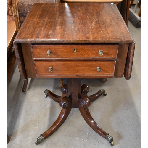 608 - A Regency mahogany drop leaf side table with 2 drawers, tapering octagonal column and scroll quadraf... 