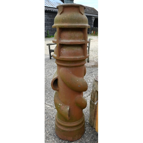 61 - An large old weathered 'Spiralvent' chimney pot to/with three other assorted old chimney pots and a ... 