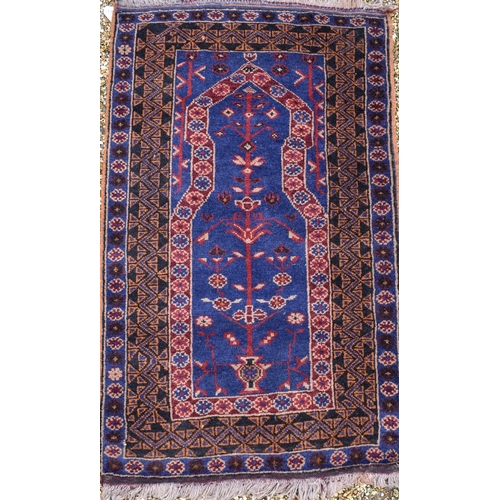 613 - A Persian Bokhara rug, gul design on brick ground, multi borders, 105 cm x 51 cm, to/w two Baluch na... 