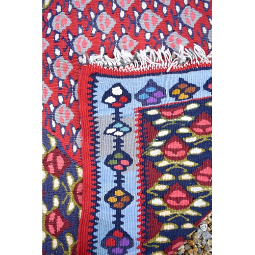 617 - Red and blue floral design kelim mat to/w brown and tan banded soumak with geometric motifs (2)